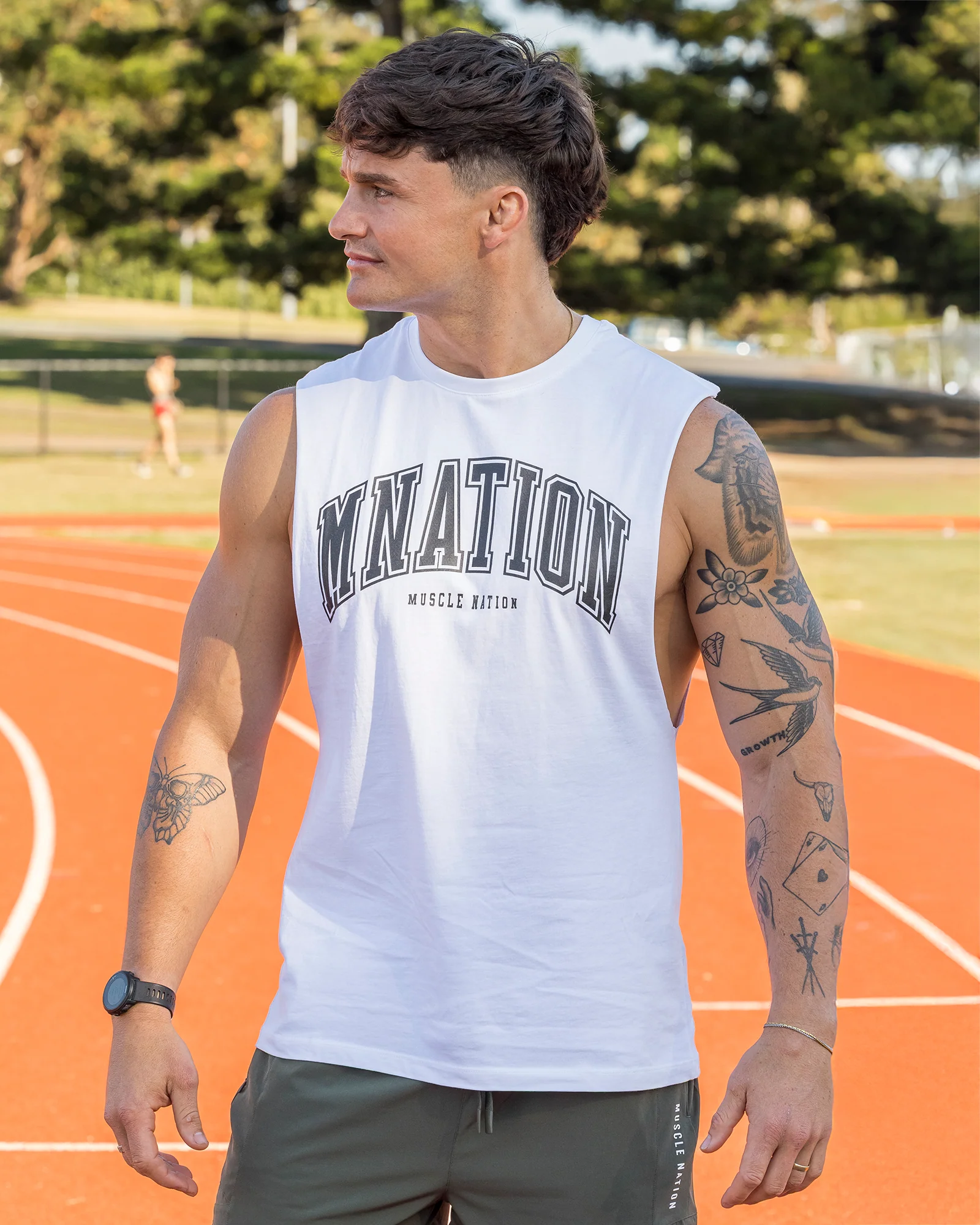 Varsity Training Drop Arm Tank - White